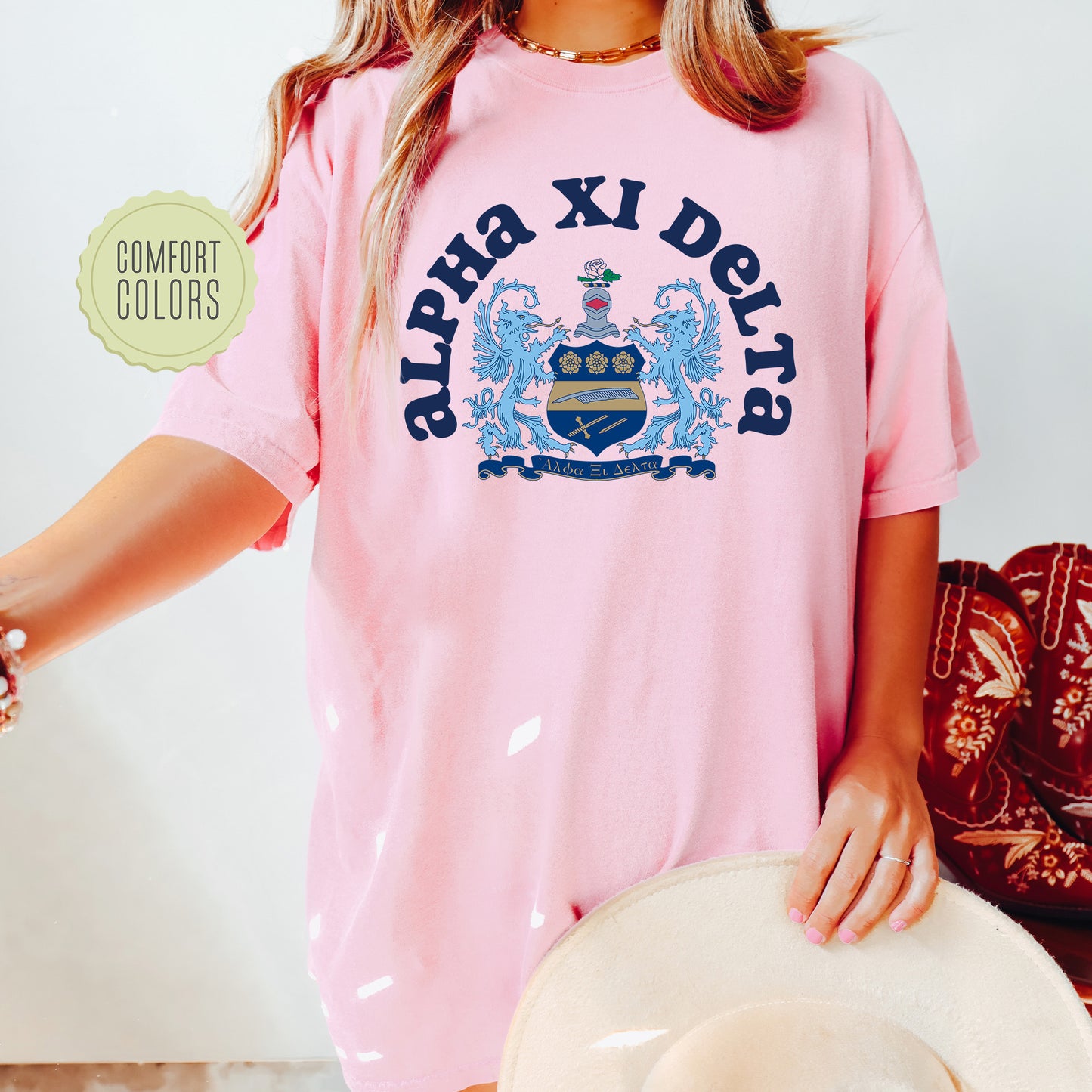 a woman wearing a pink shirt and hat