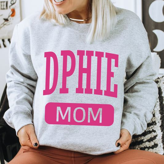 a woman wearing a sweatshirt that says dppie mom