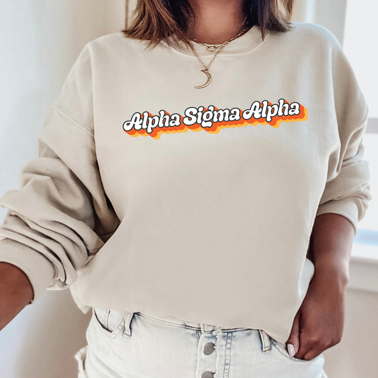 a woman wearing a sweatshirt with the word africa on it
