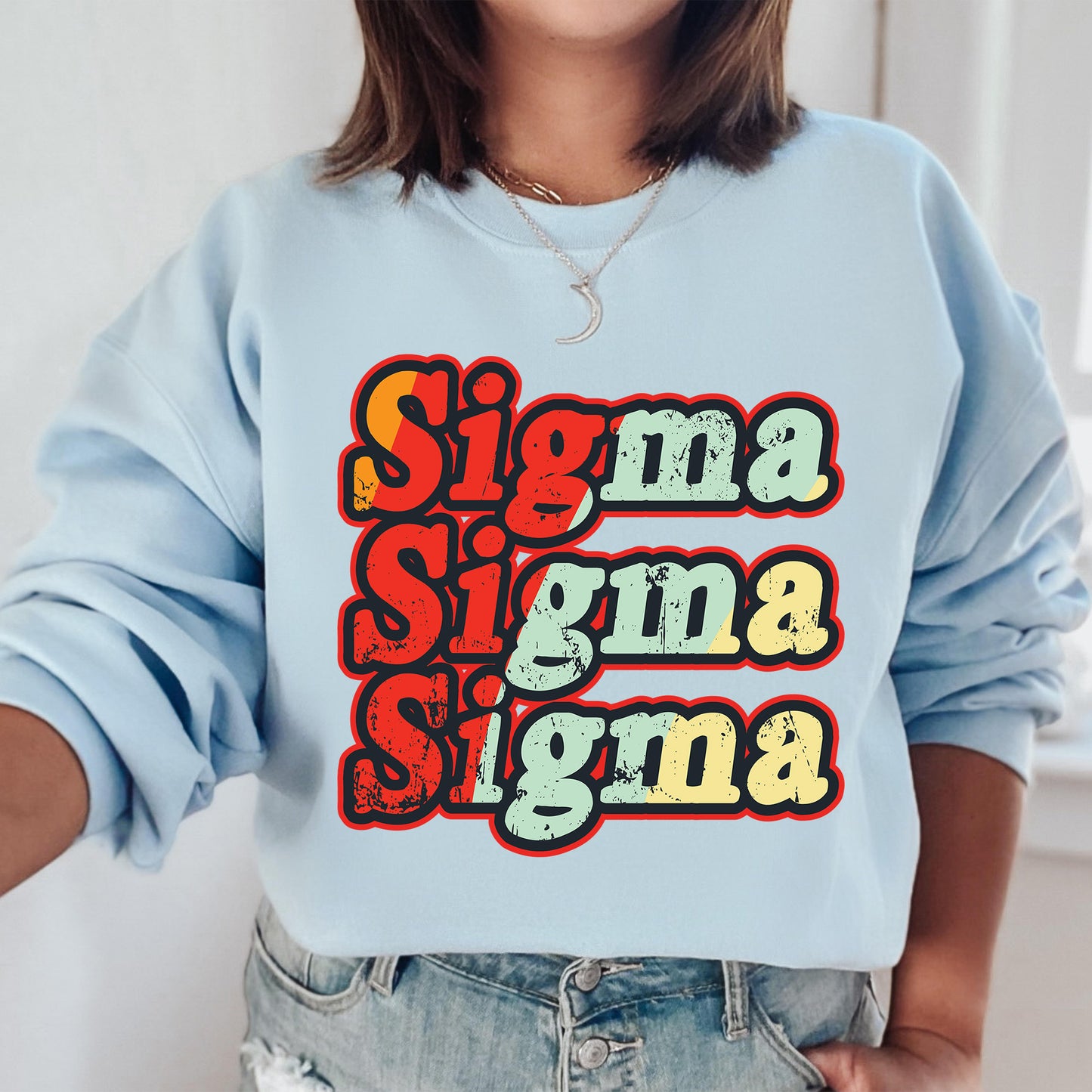 a woman wearing a blue sweatshirt that says sing sing sing