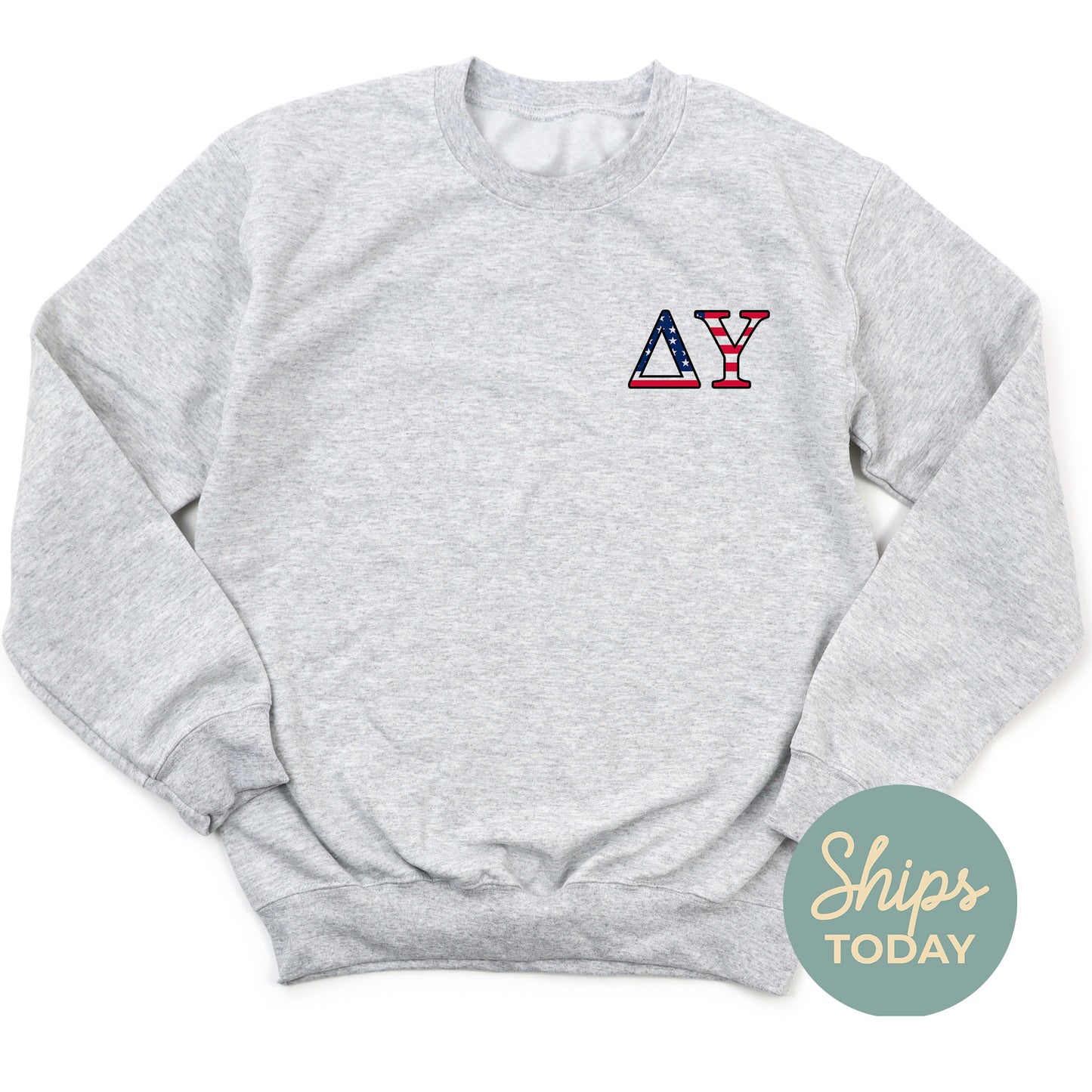 a grey sweatshirt with the letters a and y on it