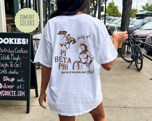a woman walking down a sidewalk while wearing a white shirt
