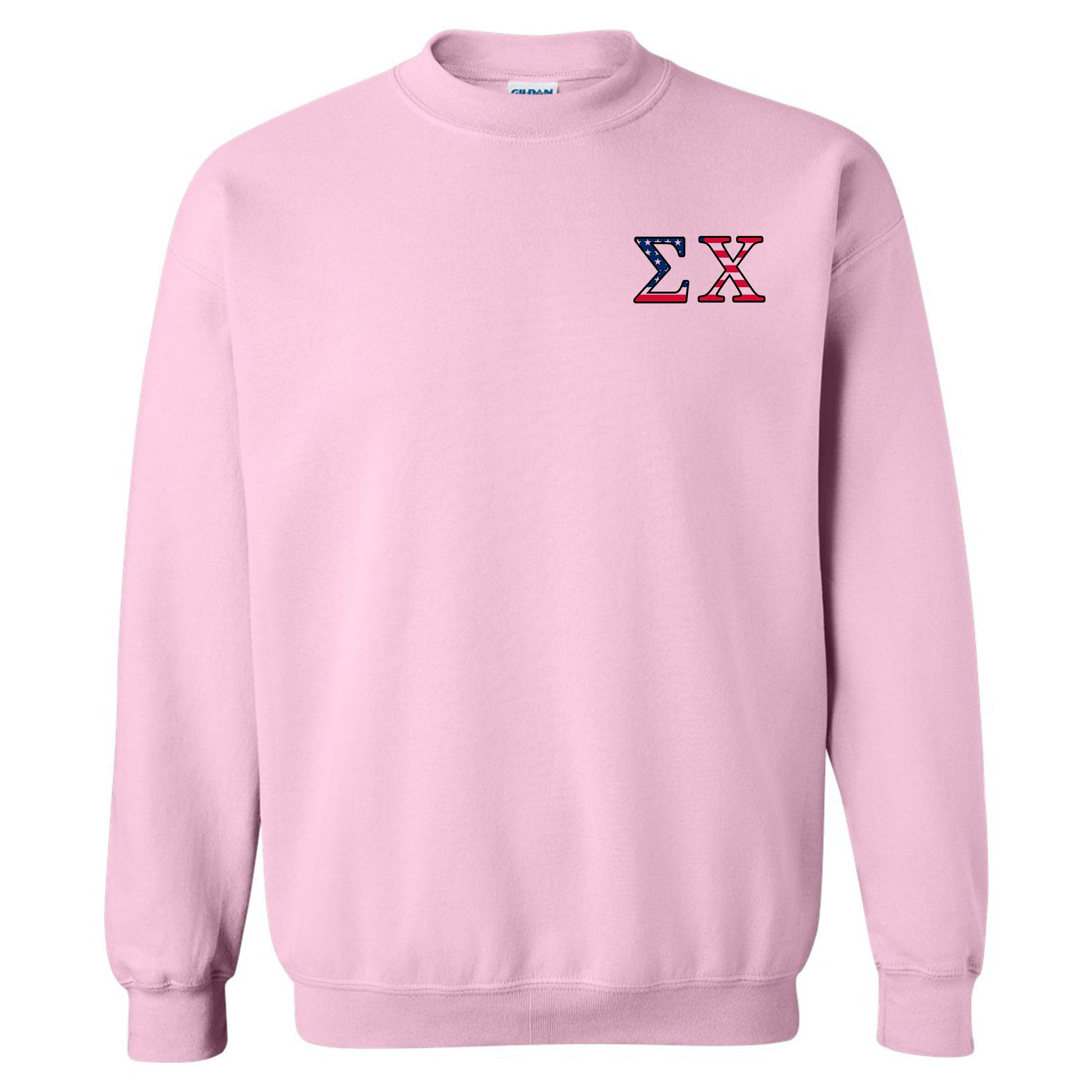 a pink sweatshirt with the letter x on it