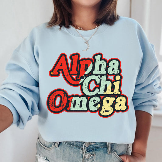 a woman wearing a blue sweatshirt with the word'apha chi omega'printed