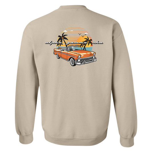 a tan sweatshirt with an orange car and palm trees