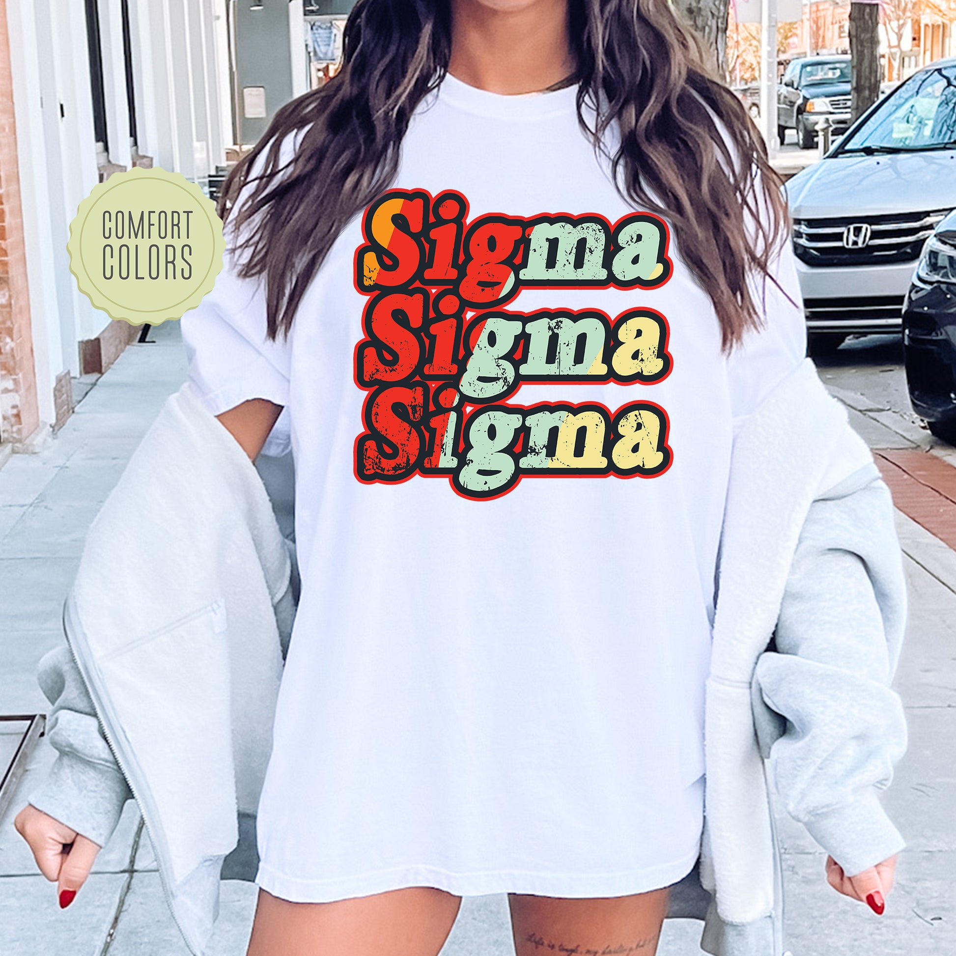 a woman wearing a white shirt with the words stigma stigma stigma on it