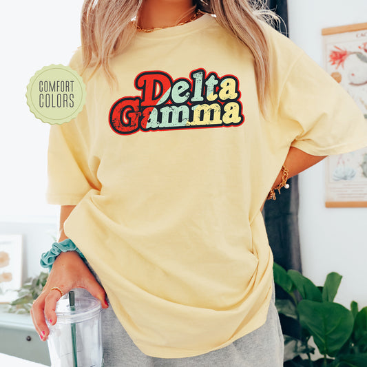 a woman in a yellow shirt holding a blender