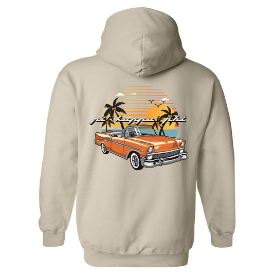a white hoodie with an orange car and palm trees