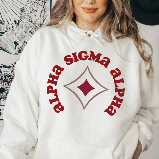 a woman wearing a white sweatshirt with a red and white graphic on it