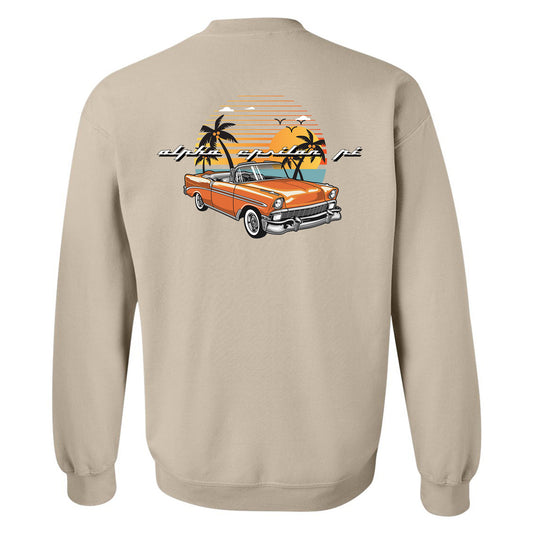 a tan sweatshirt with an orange car and palm trees
