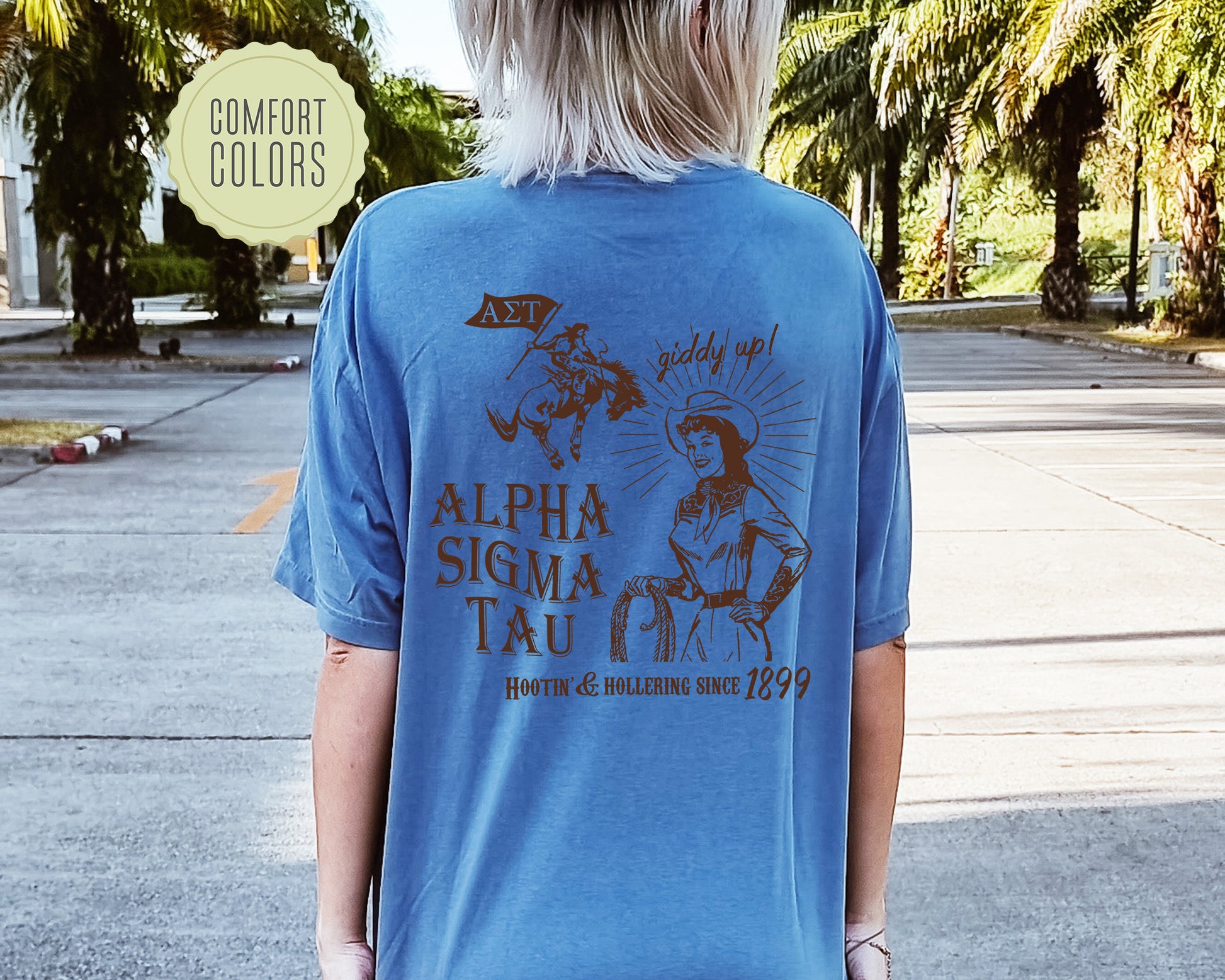 a woman in a blue shirt is walking down the street