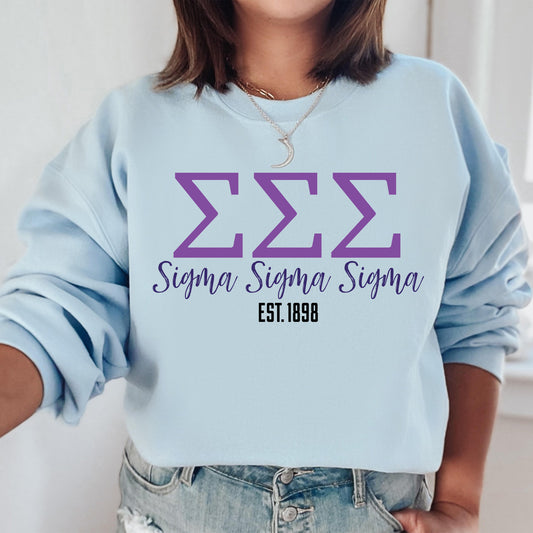 a woman wearing a blue sweatshirt with the number 532 on it