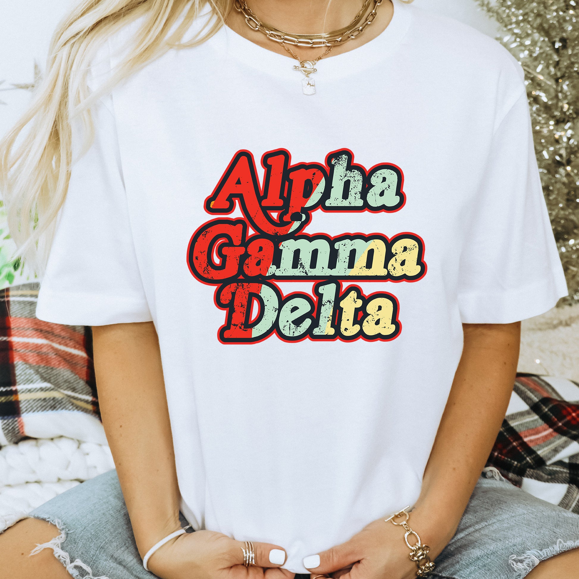 a woman wearing a white shirt that says aloha gumma delta