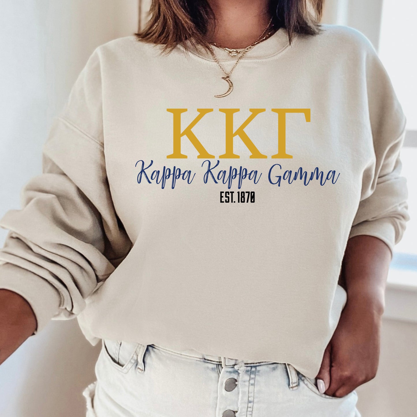 a woman wearing a sweatshirt that says kilt