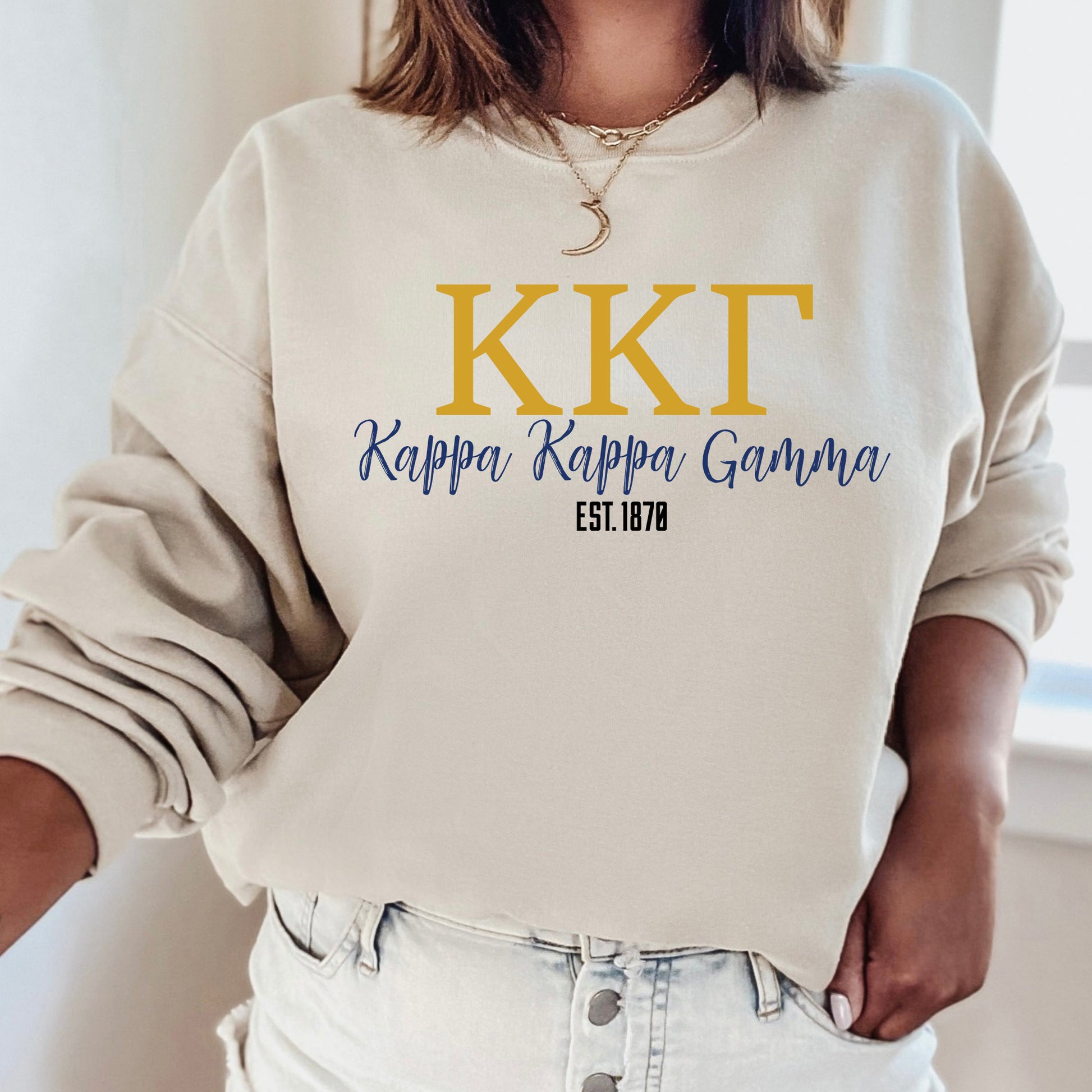 a woman wearing a sweatshirt that says kilt