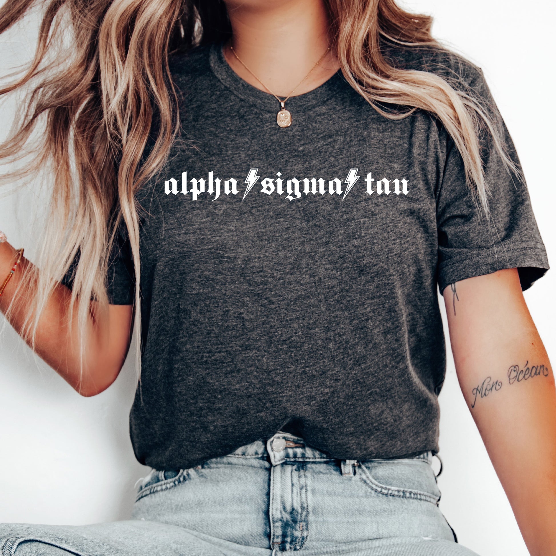 a woman with long hair wearing a black shirt