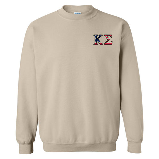 a sweatshirt with the letter k in red, white, and blue