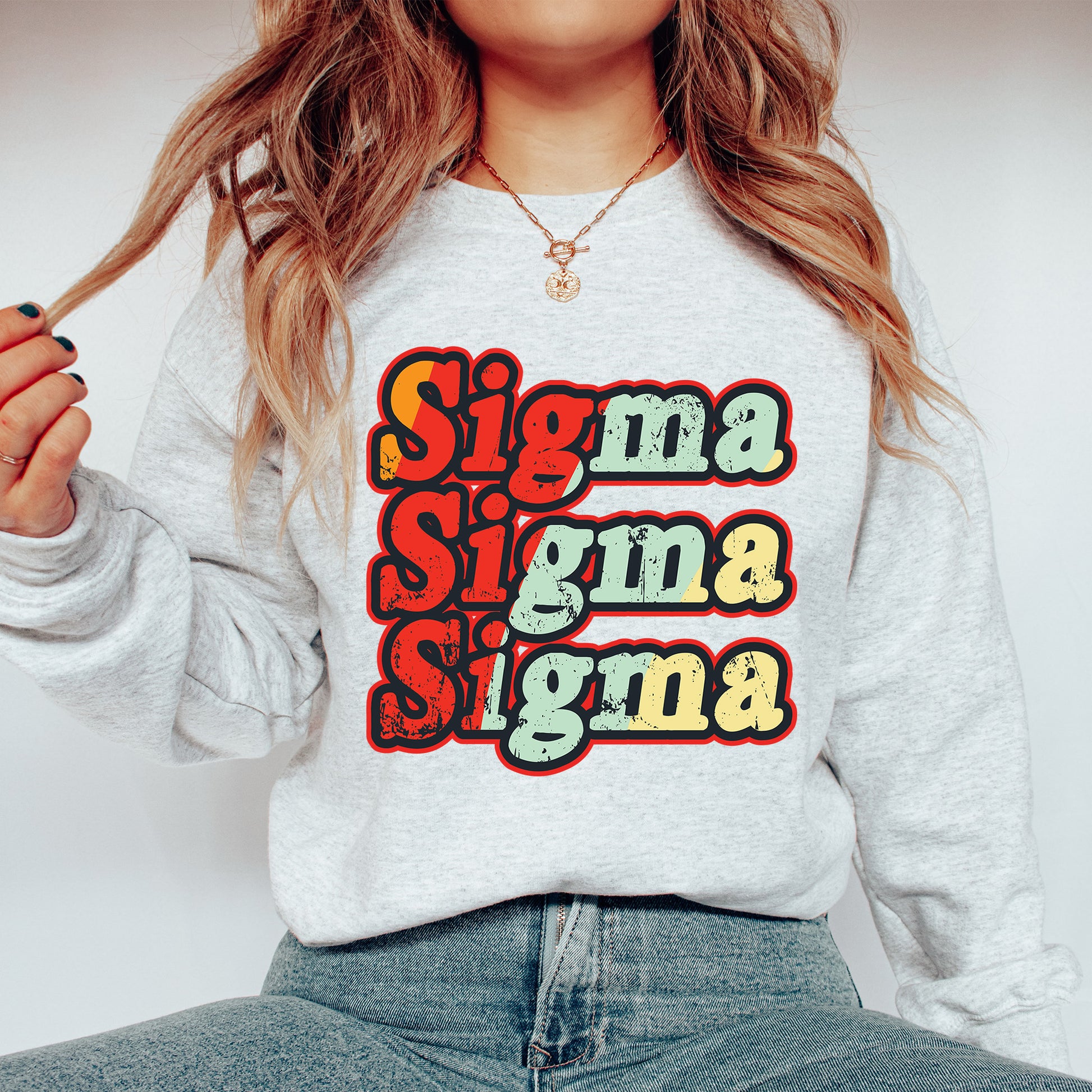 a woman wearing a sweatshirt that says singma singma