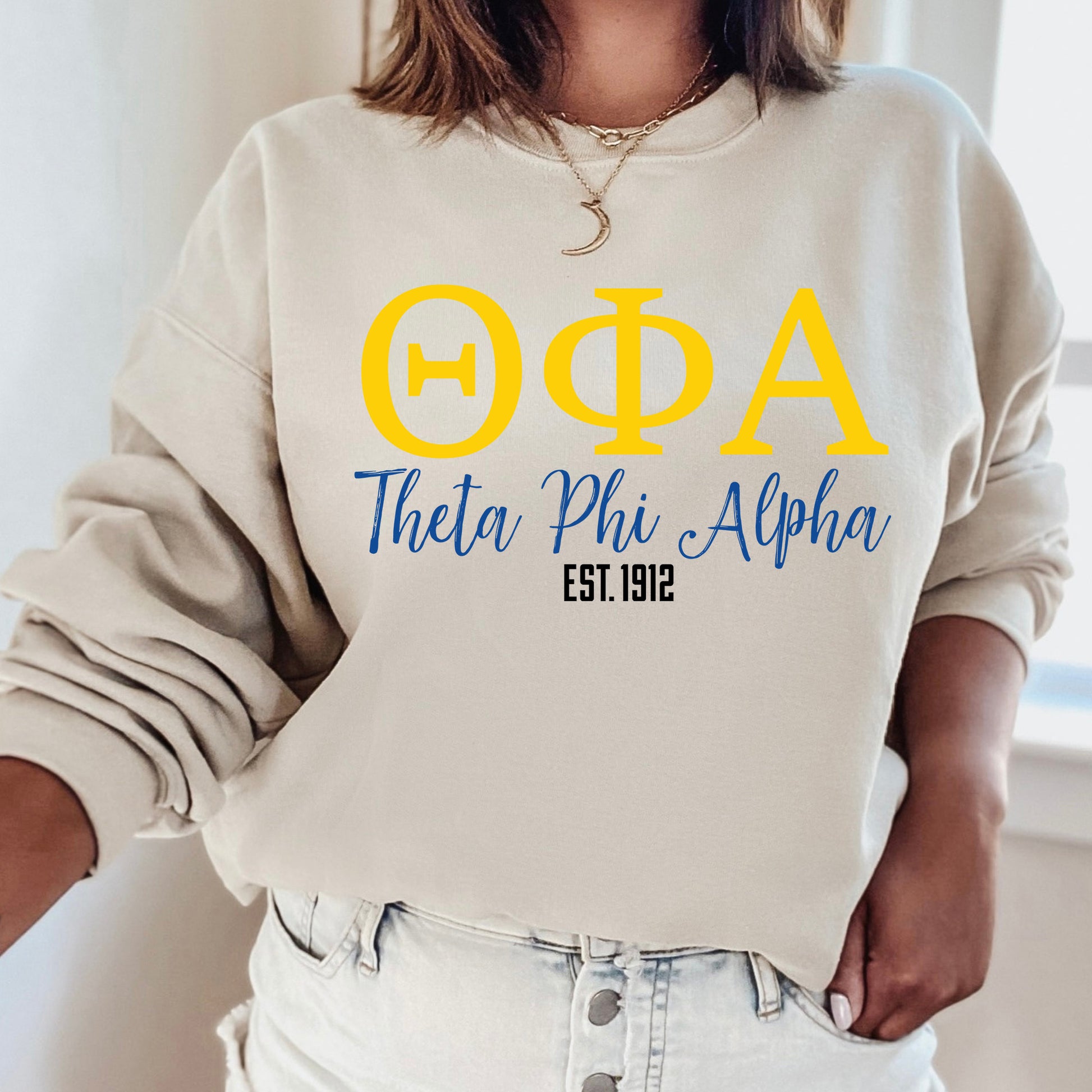 a woman wearing a sweatshirt that says opa