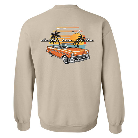 a tan sweatshirt with an orange car and palm trees