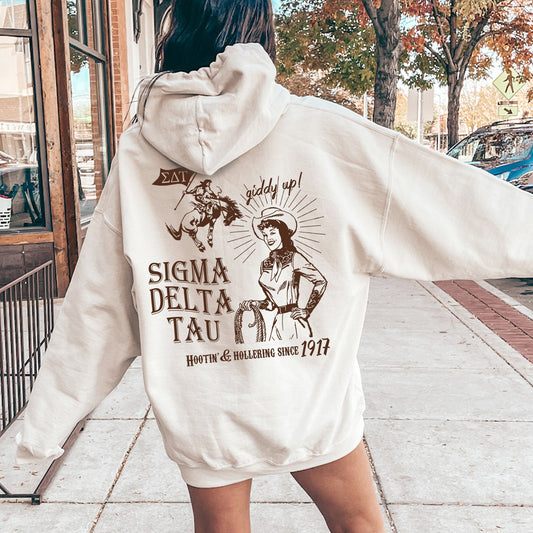 a woman in a white hoodie is walking down the street