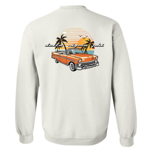 a white sweatshirt with an orange car and palm trees
