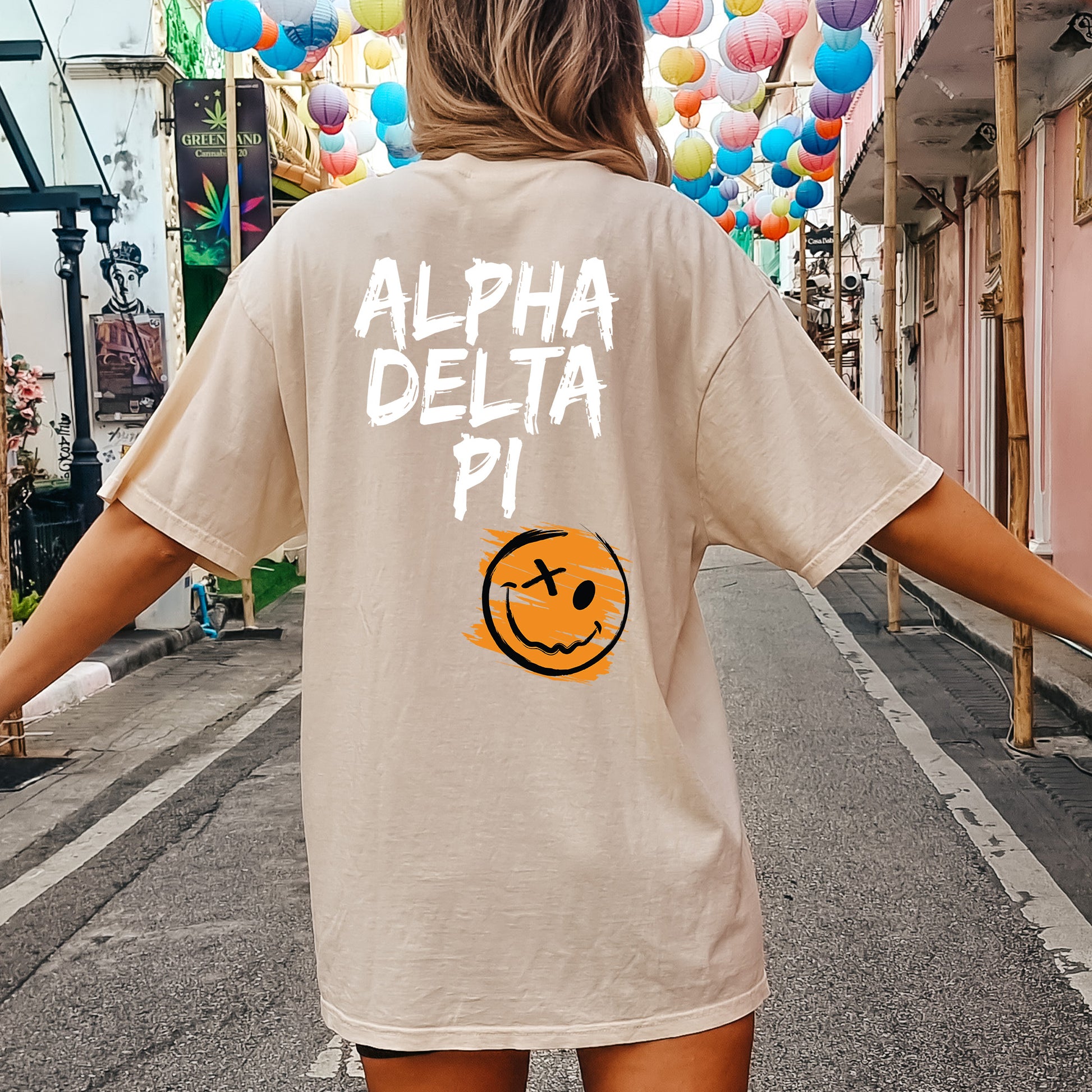 a woman walking down a street holding her arms out