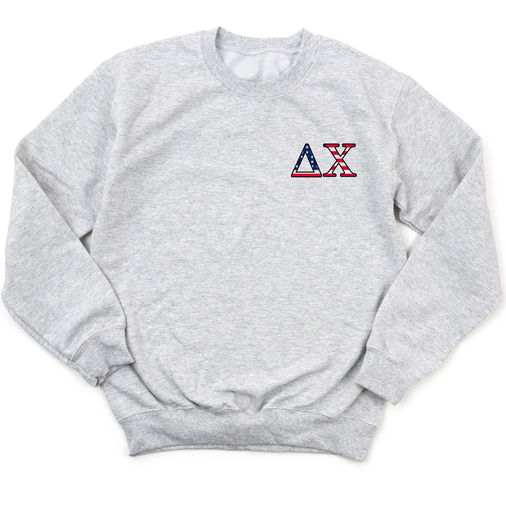 a grey sweatshirt with a red, white, and blue x on it