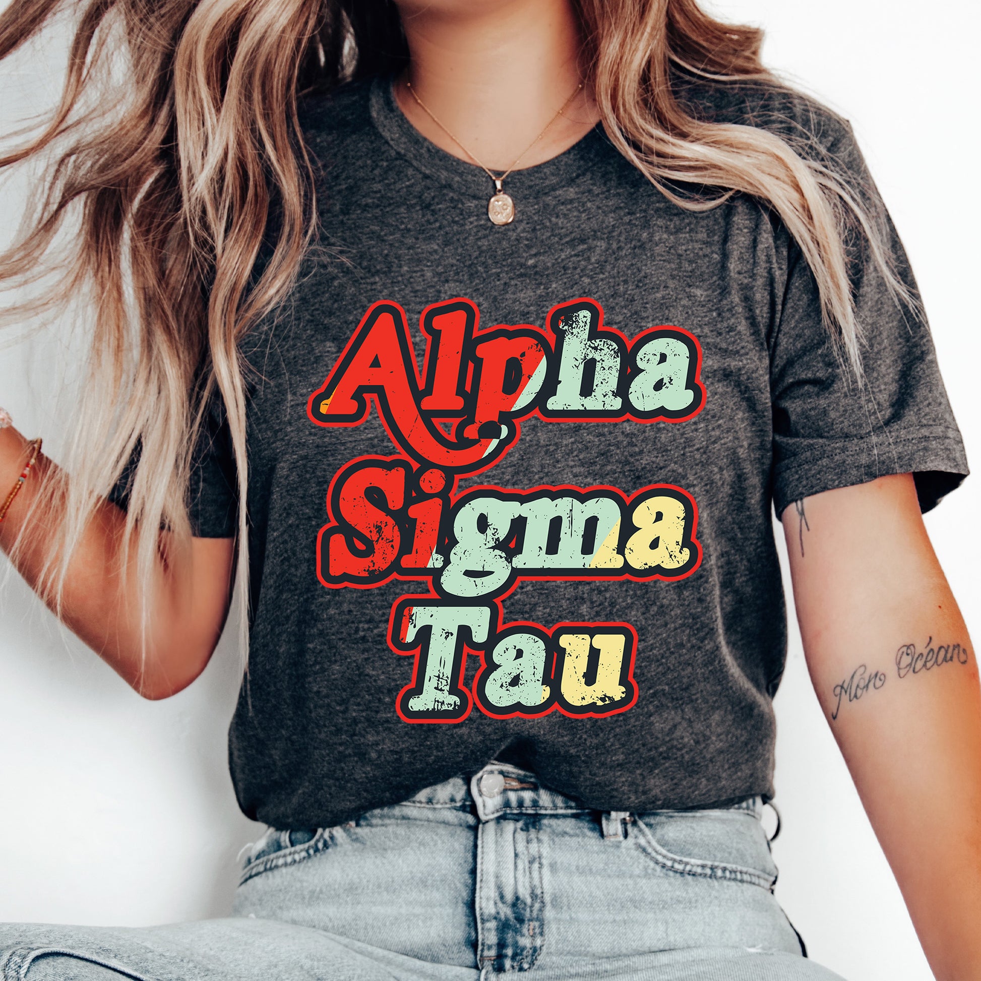 a woman wearing a shirt that says aloha sigma tau