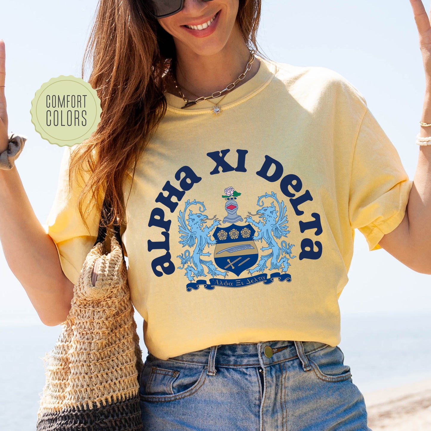 a woman in a yellow shirt holding up a peace sign