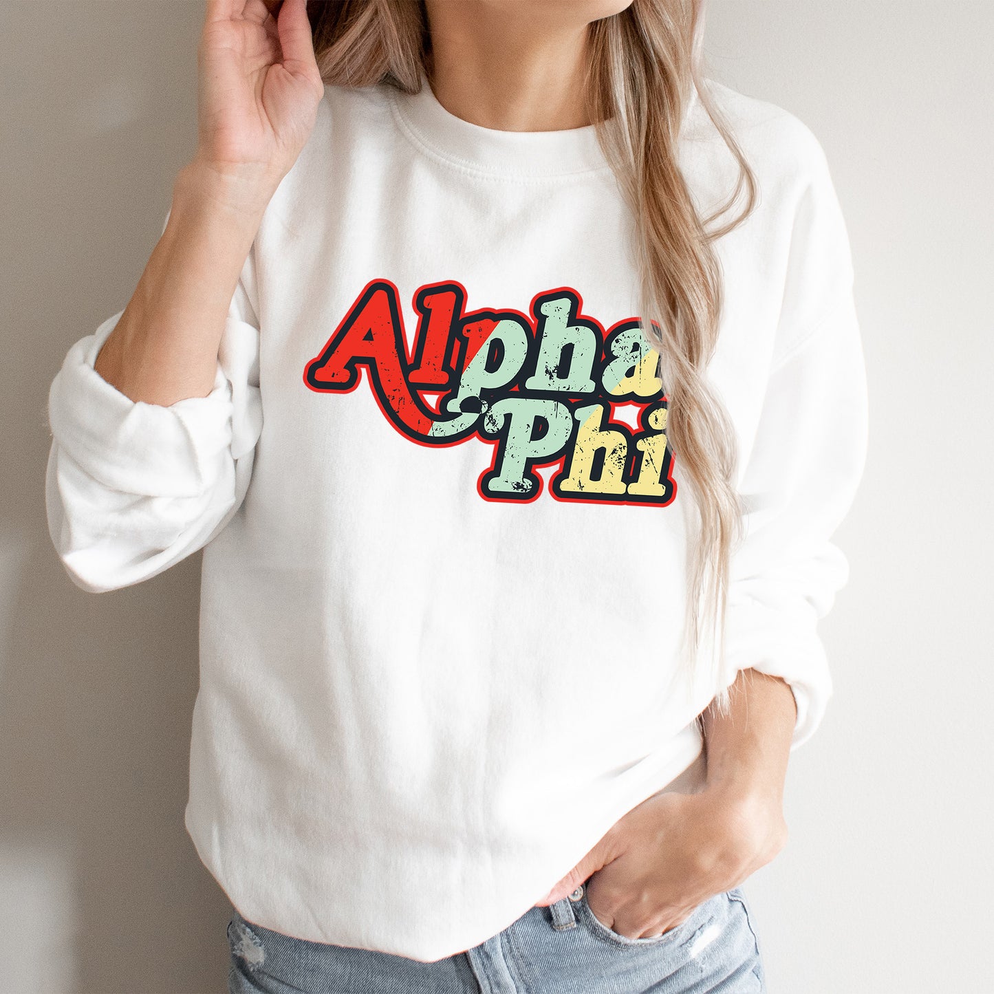 a woman wearing a white sweatshirt with the word aloha pit on it