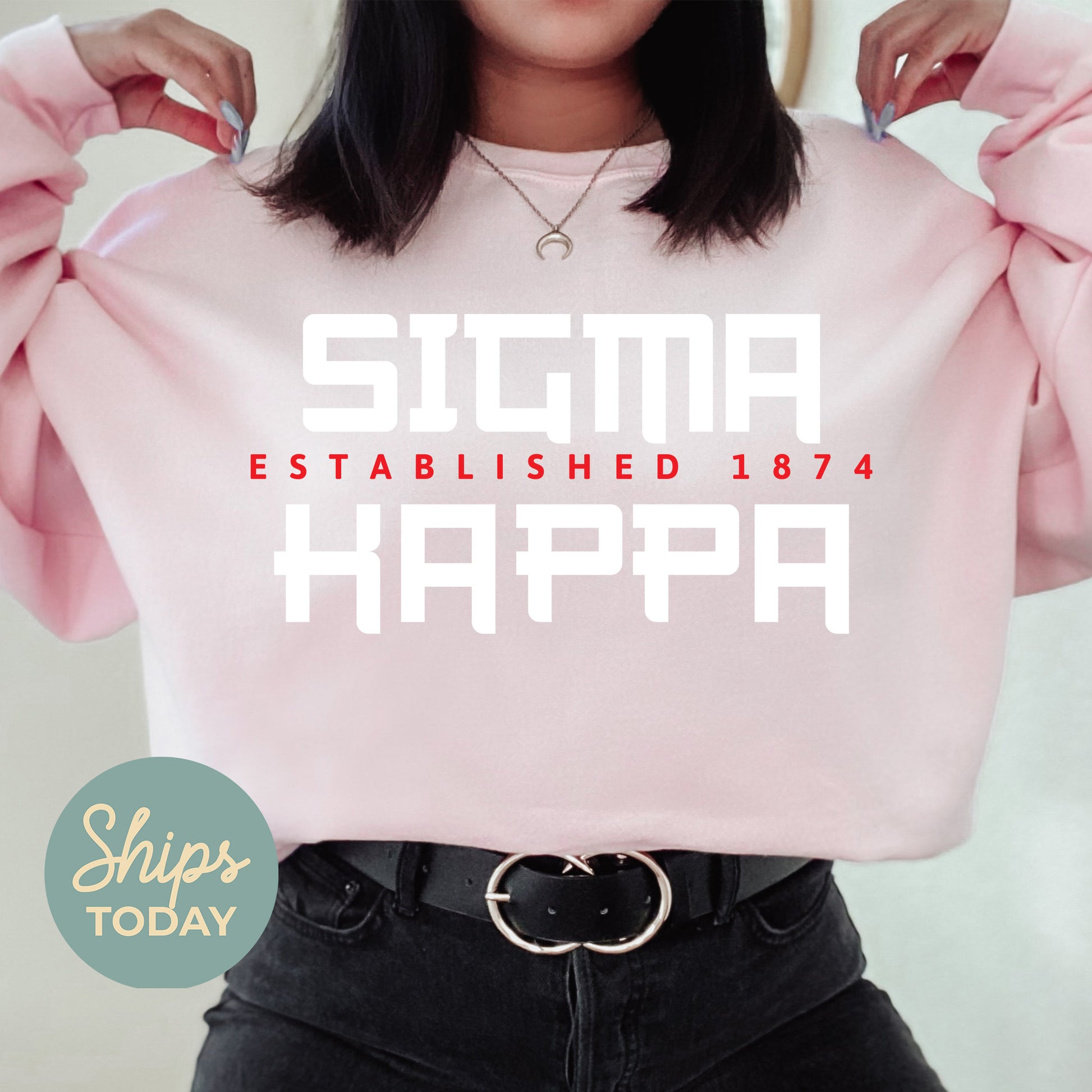 a woman wearing a pink sweatshirt with the words stigma established in white