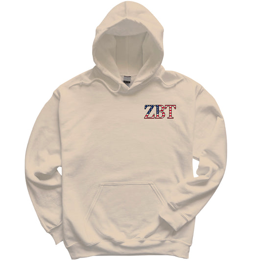 a white hoodie with the letter zt on it