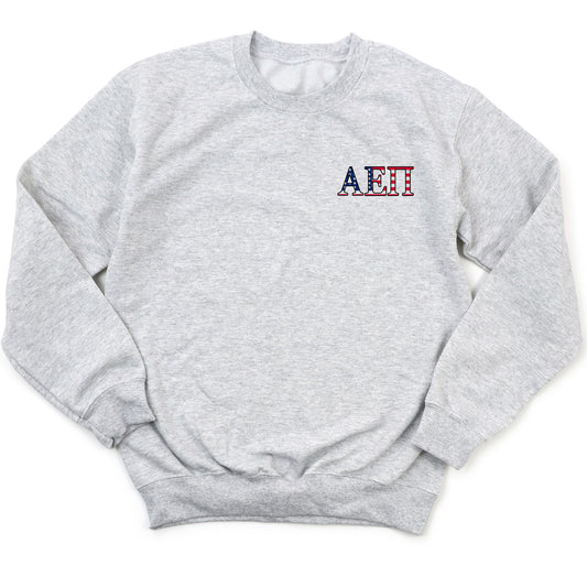 a grey sweatshirt with the word aet on it
