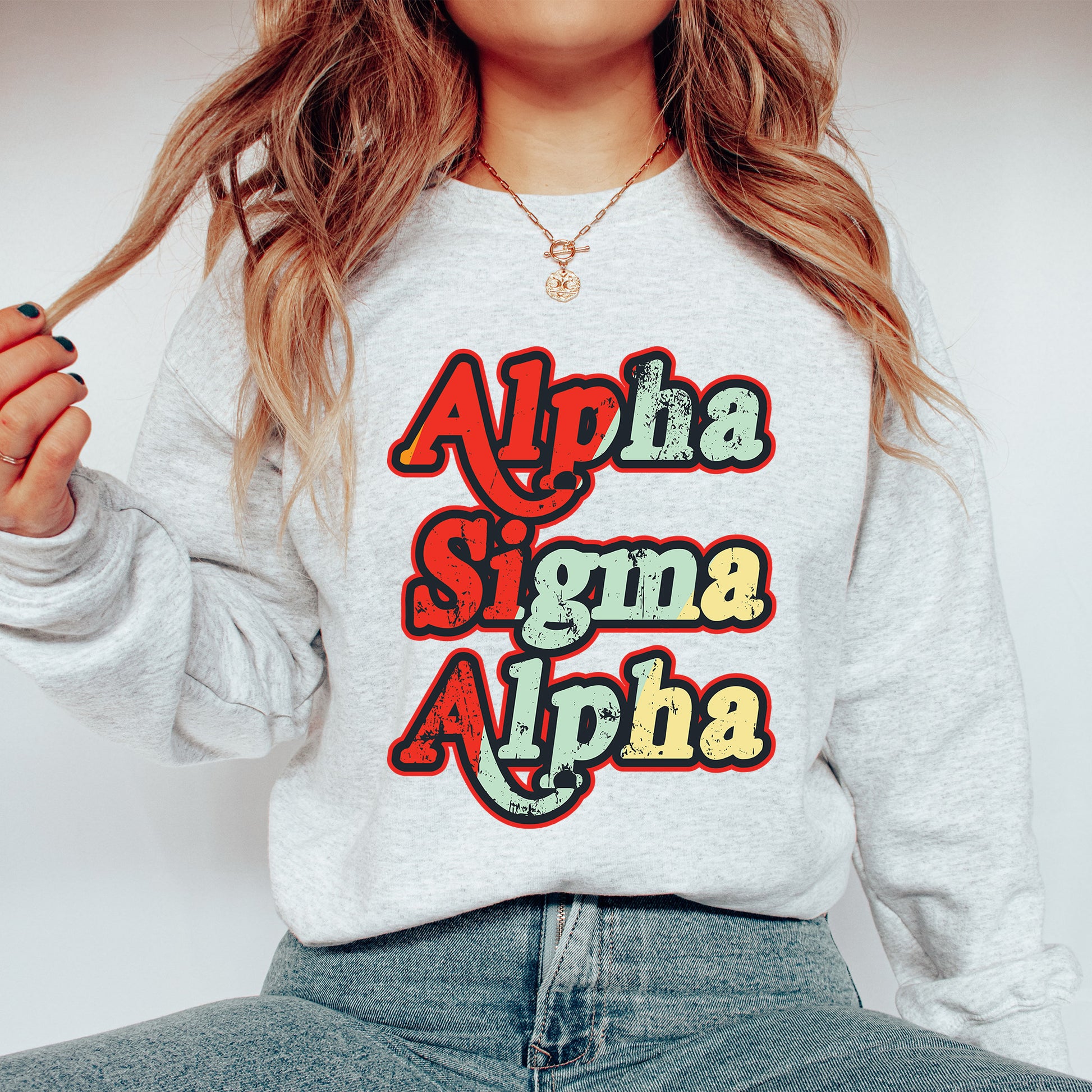 a woman wearing a sweatshirt that says aloha, signa, aloh
