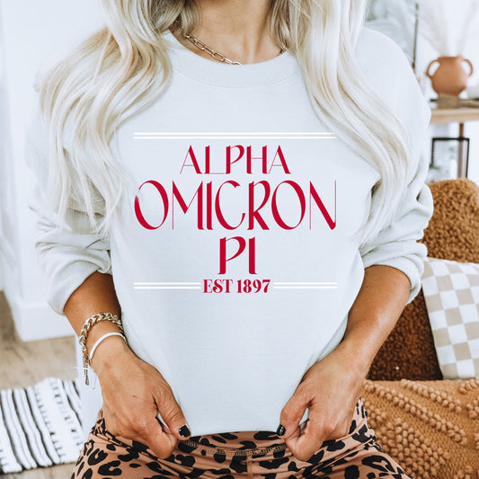 a woman wearing a white sweatshirt with a red graphic on it