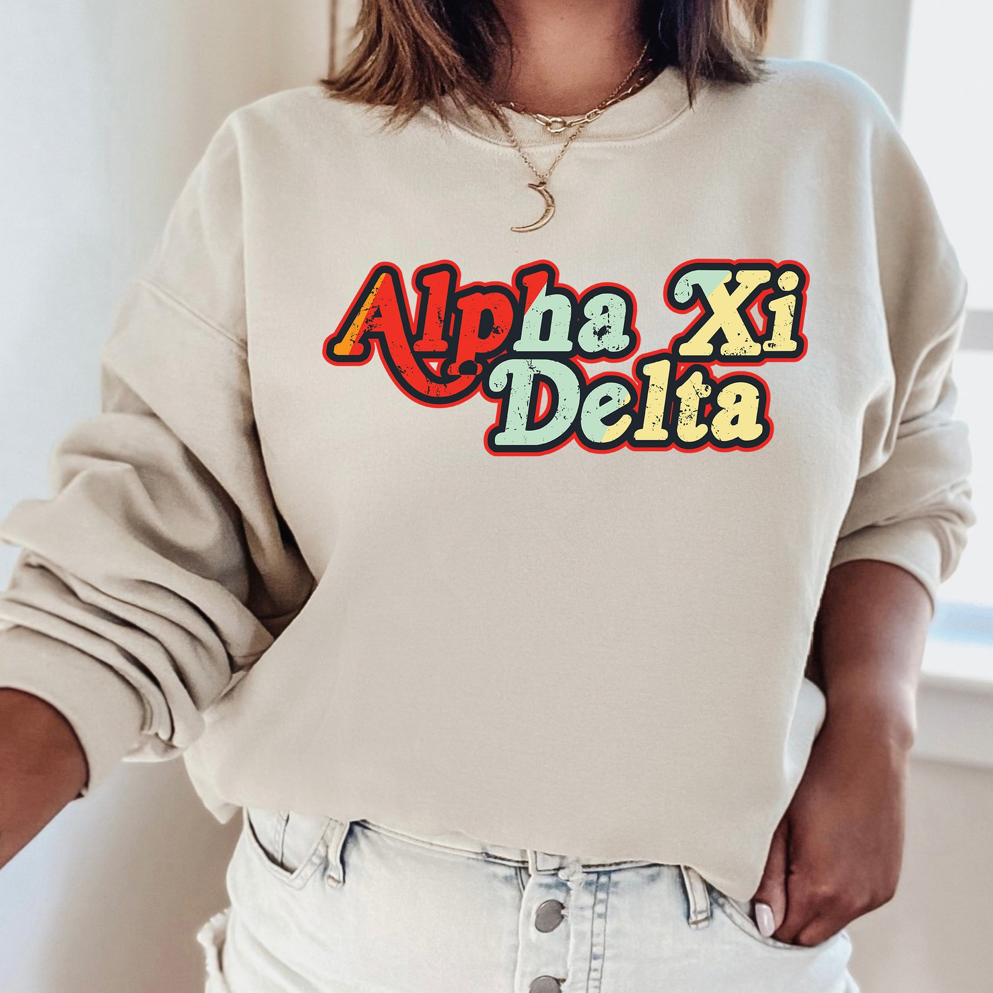 a woman wearing a sweatshirt with the word delta on it