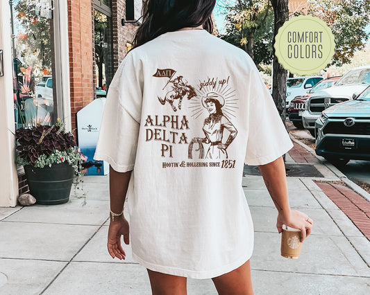 a woman walking down a sidewalk holding a cup of coffee