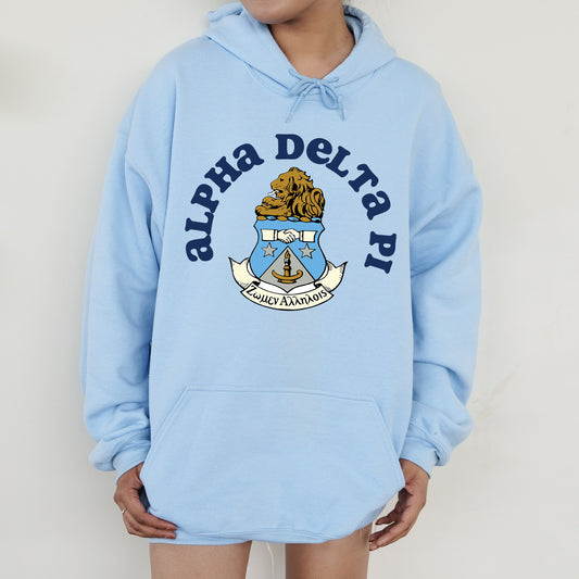 a young boy wearing a blue delta hoodie