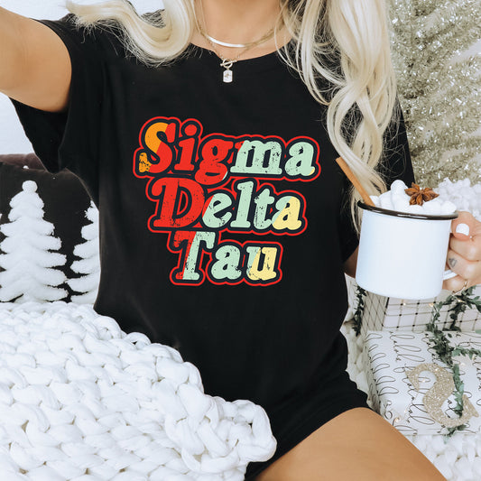 a woman sitting on a couch holding a cup of coffee