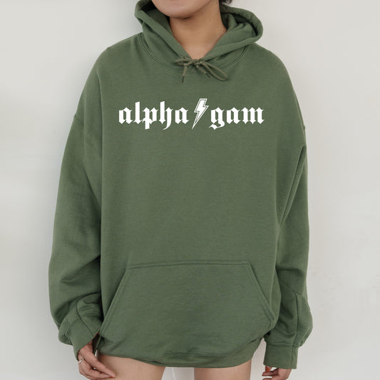 a person wearing a green sweatshirt with the word alphonagm printed on it