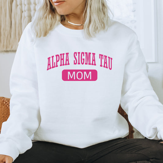 a woman sitting on a chair wearing a white sweatshirt