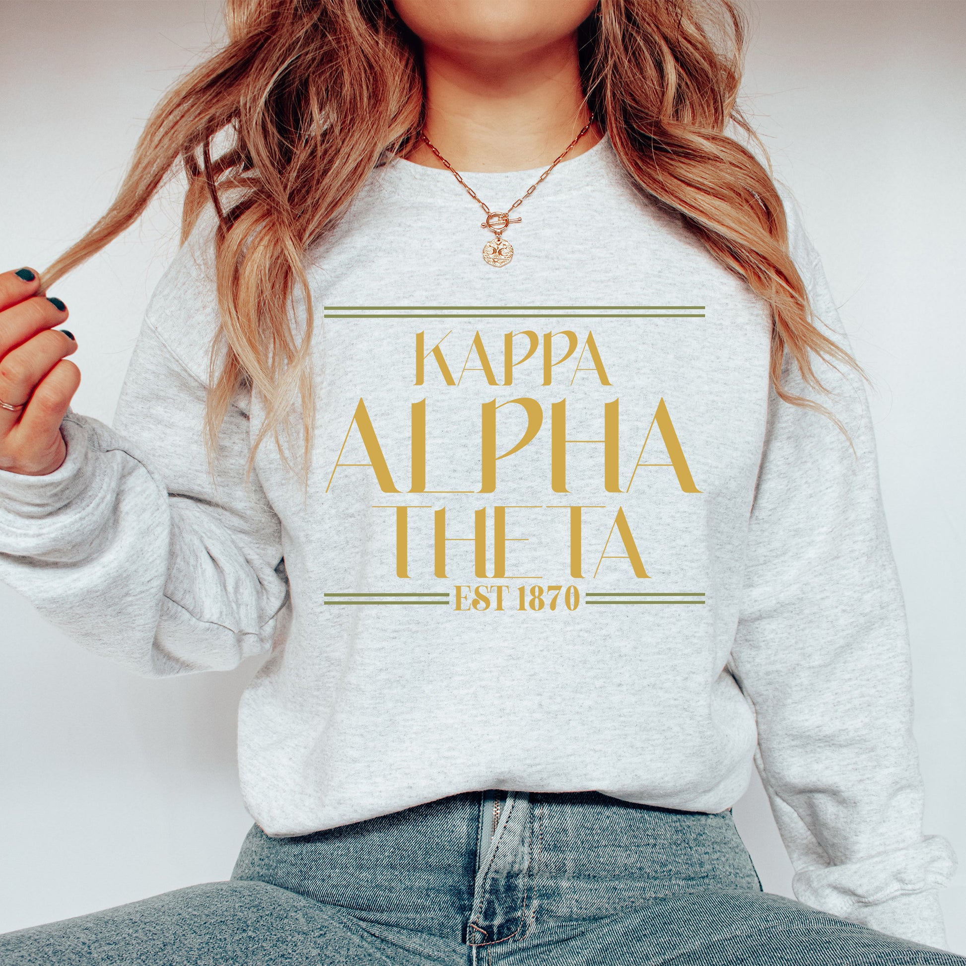 a woman wearing a sweatshirt with the words kapaa aloha on it