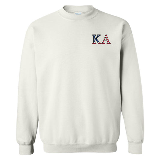 a white sweatshirt with the letters a and a in red, white, and blue