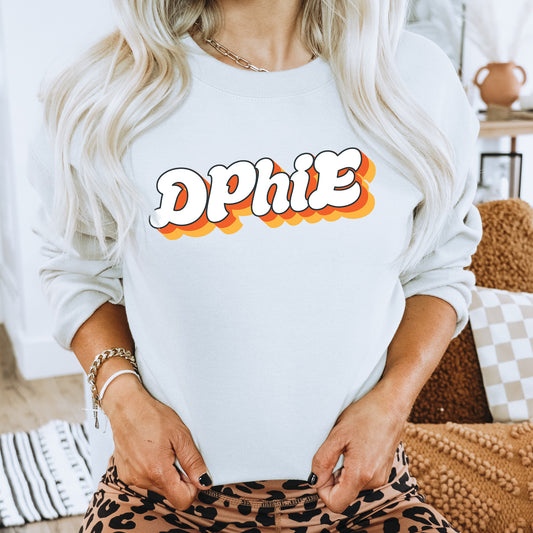 a woman with blonde hair wearing a white sweatshirt and leopard print pants