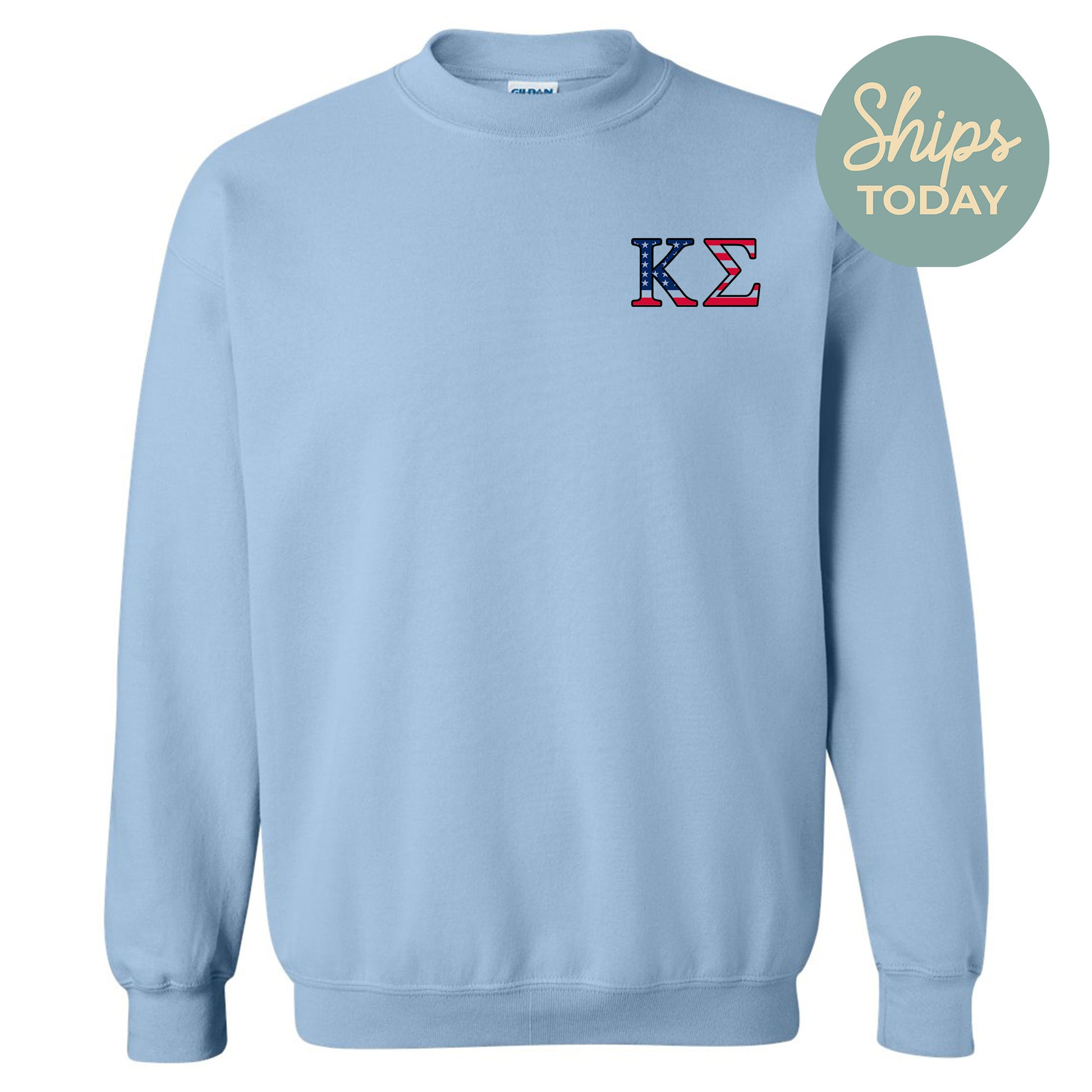 a light blue sweatshirt with the k logo on it