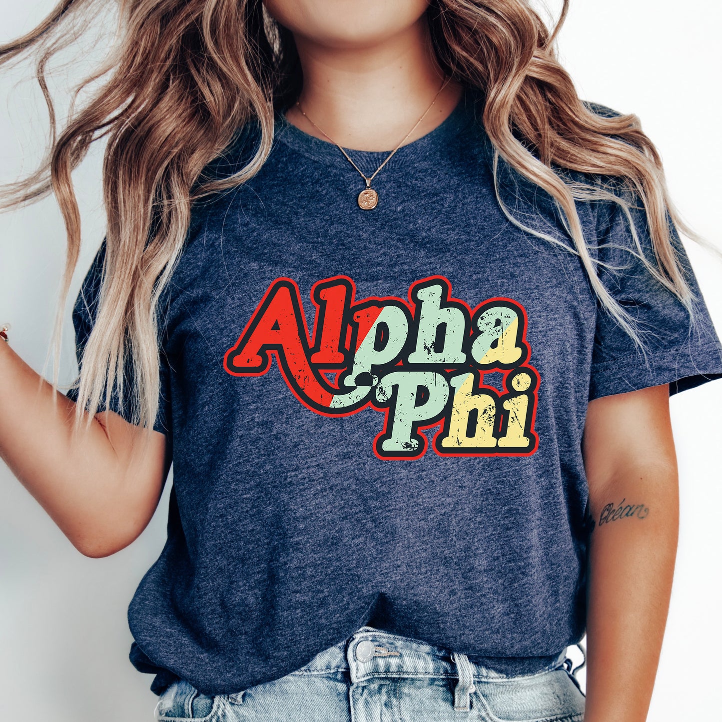 a woman with long hair wearing a shirt that says aloha phi