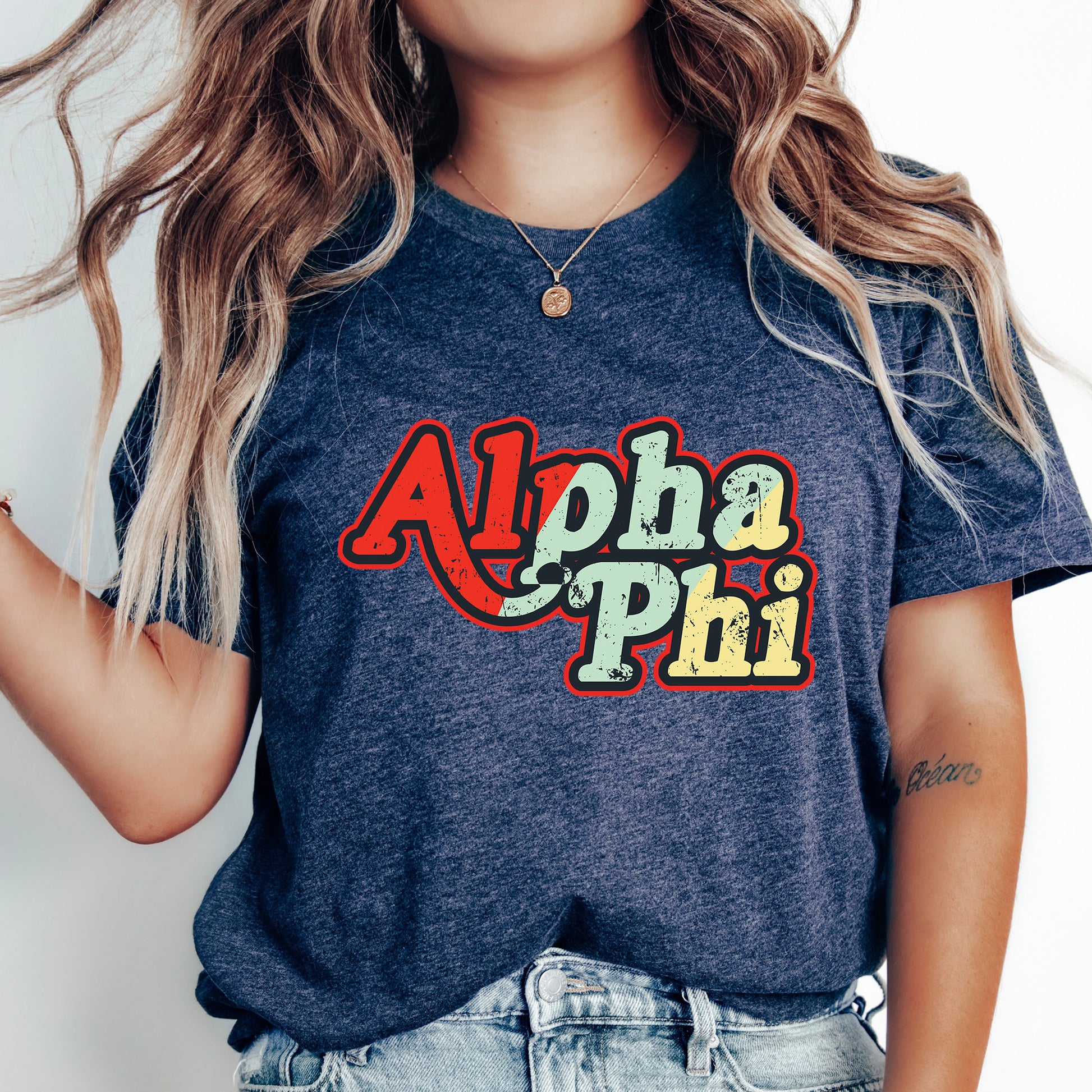 a woman with long hair wearing a shirt that says aloha phi