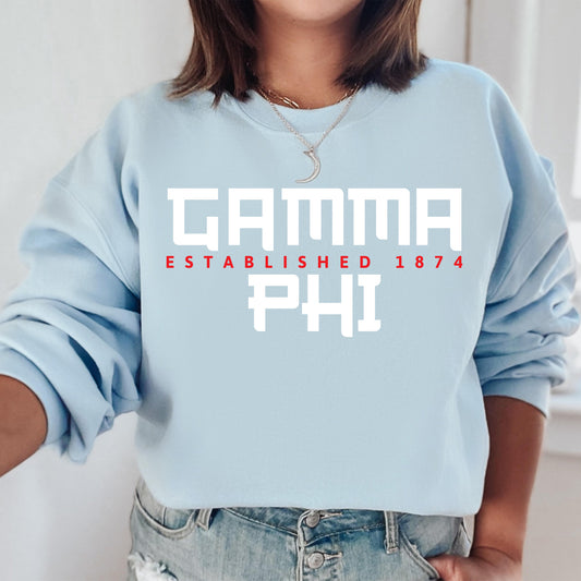 a woman wearing a blue sweatshirt that says camma established 1974