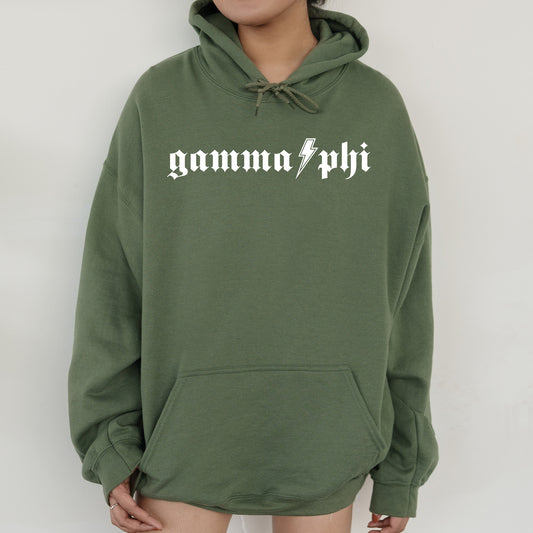 a woman wearing a green hoodie with the word gauna phi printed on it
